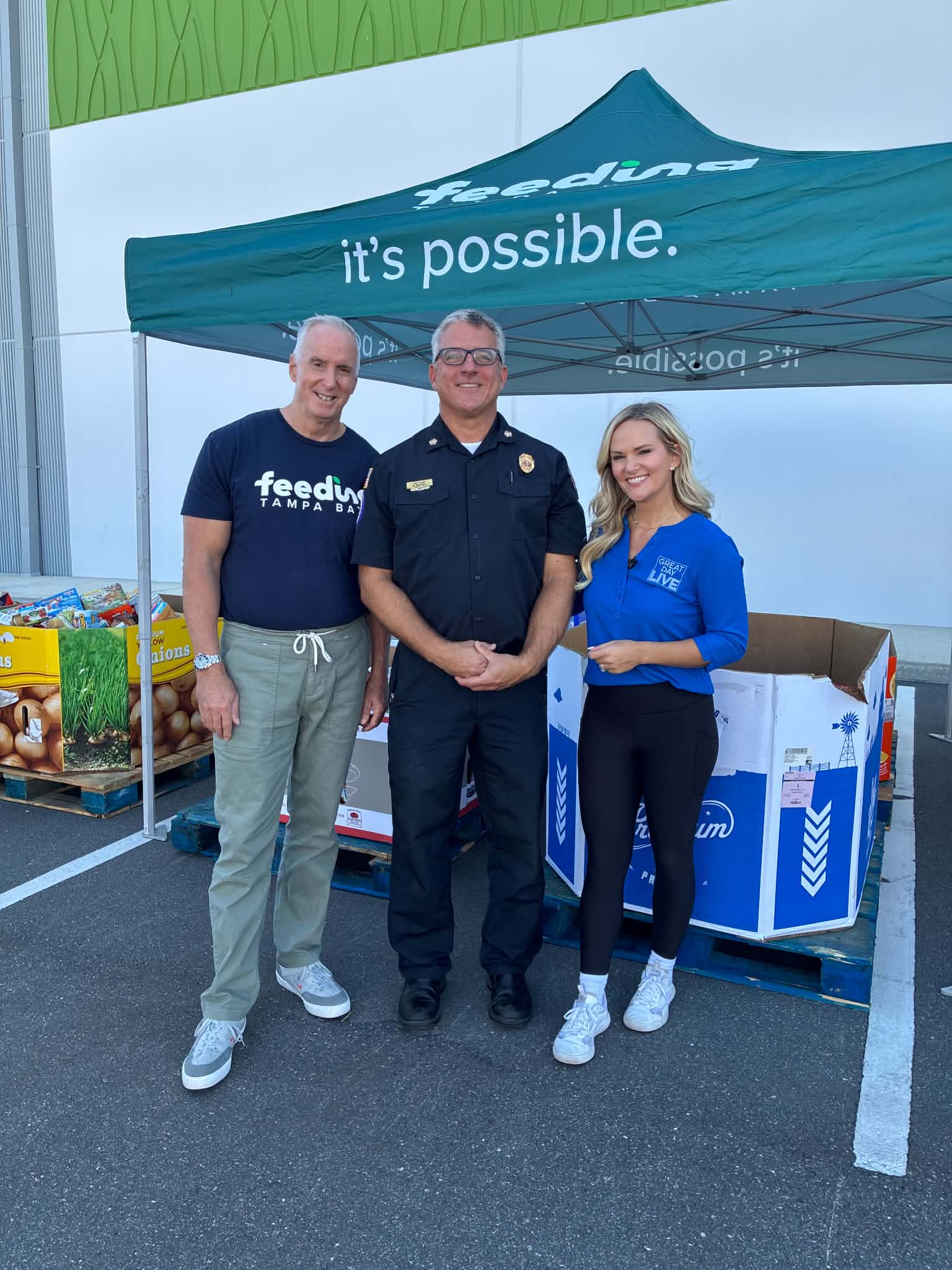 3 people posing outside of cereal donations